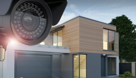 Security camera and exterior view of the house, 3d illustration